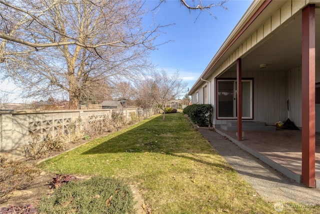 view of yard featuring fence