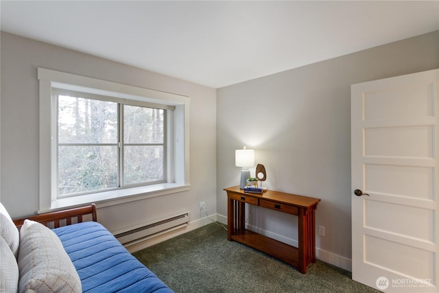 living area with a baseboard radiator, carpet floors, and baseboards