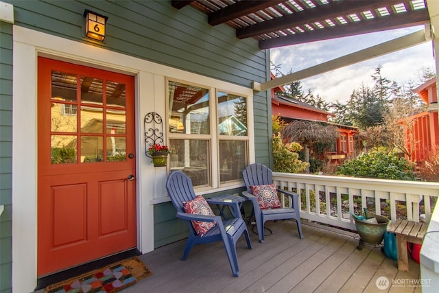 wooden terrace featuring a pergola