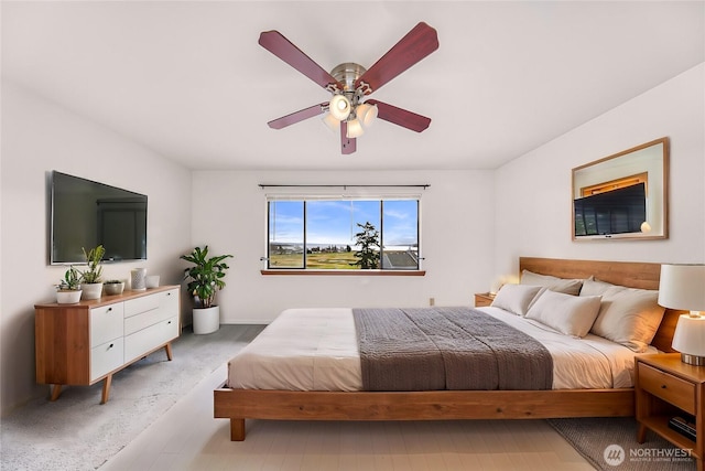 carpeted bedroom featuring ceiling fan