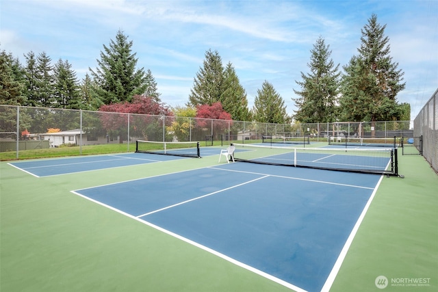 view of sport court with community basketball court and fence