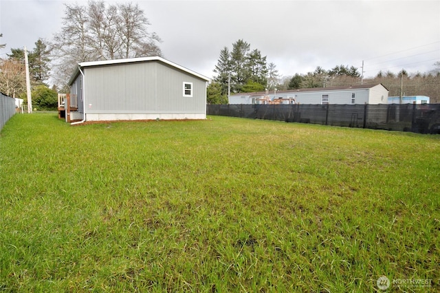 view of yard featuring fence