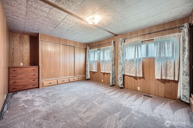 3222 S 183rd St, Seatac, WA 98188 - carpeted spare room with wood walls and visible vents