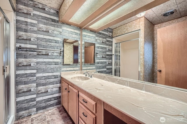 3222 S 183rd St, Seatac, WA 98188 - full bath featuring a stall shower, wood walls, and vanity