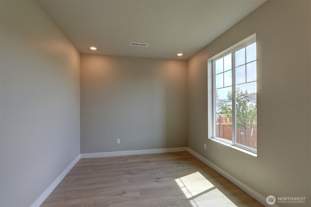 20907 150th St E Unit 1460, Bonney Lake, WA 98391 - spare room featuring recessed lighting, light wood-type flooring, visible vents, and baseboards