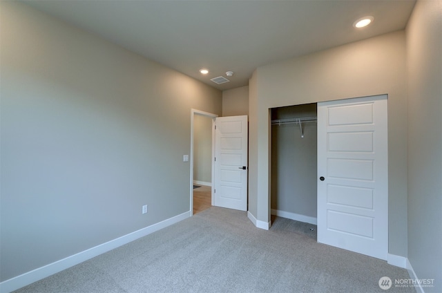 20907 150th St E Unit 1460, Bonney Lake, WA 98391 - unfurnished bedroom featuring carpet floors, recessed lighting, a closet, and baseboards