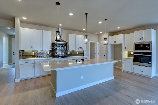 20907 150th St E Unit 1460, Bonney Lake, WA 98391 - kitchen featuring a sink, gas cooktop, black microwave, oven, and wall chimney exhaust hood