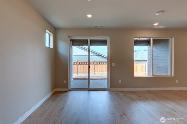 20907 150th St E Unit 1460, Bonney Lake, WA 98391 - empty room featuring light wood-style flooring, visible vents, baseboards, and recessed lighting