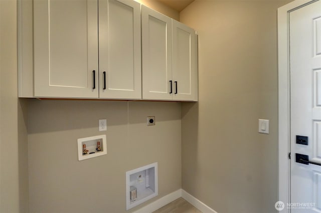 20907 150th St E Unit 1460, Bonney Lake, WA 98391 - laundry room with cabinet space, baseboards, washer hookup, and electric dryer hookup