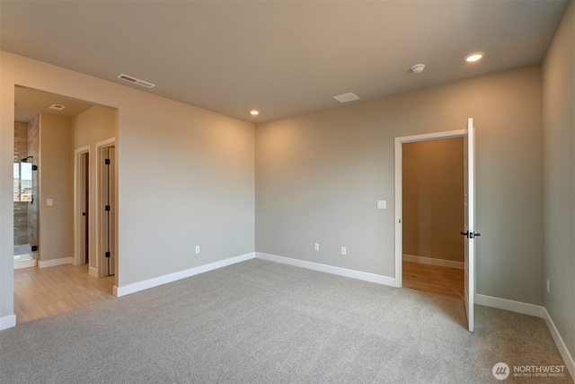20907 150th St E Unit 1460, Bonney Lake, WA 98391 - spare room with recessed lighting, light colored carpet, and baseboards