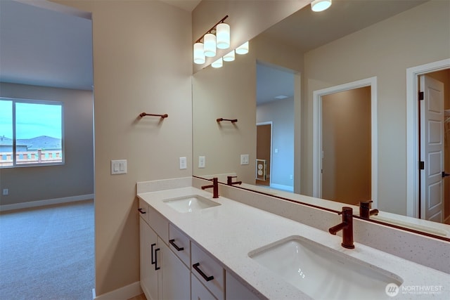 20907 150th St E Unit 1460, Bonney Lake, WA 98391 - bathroom with double vanity, a sink, and baseboards