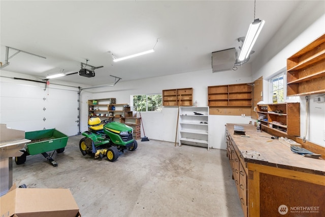 garage featuring a garage door opener