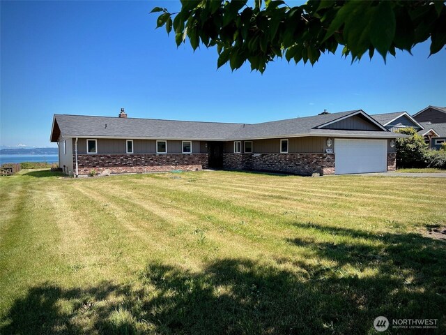 1412 Bonnie View Acres Rd, Oak Harbor, WA 98277 - ranch-style home with brick siding, a chimney, an attached garage, and a front yard