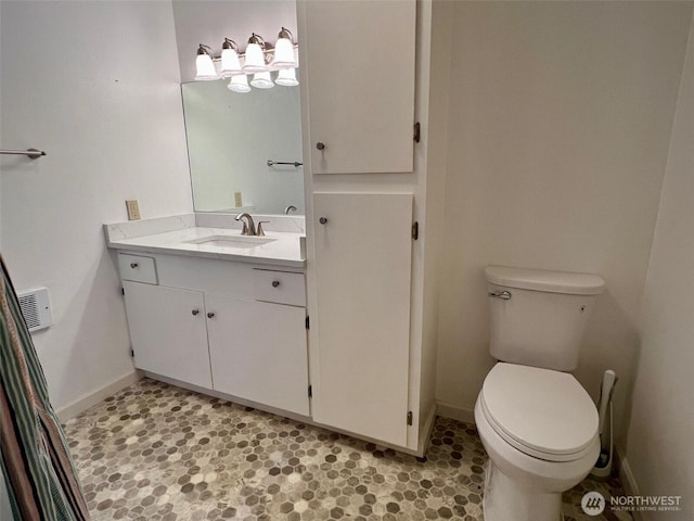1412 Bonnie View Acres Rd, Oak Harbor, WA 98277 - bathroom with toilet, vanity, and baseboards