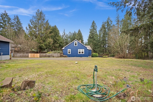 view of yard with fence