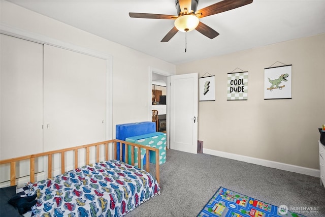 bedroom featuring a closet, carpet flooring, a ceiling fan, and baseboards