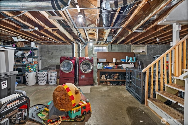 unfinished basement with independent washer and dryer and stairway