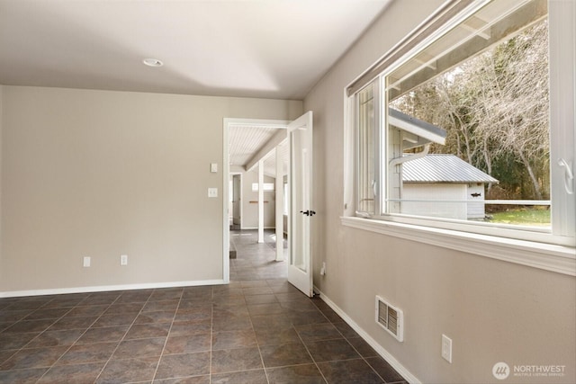 interior space featuring visible vents and baseboards