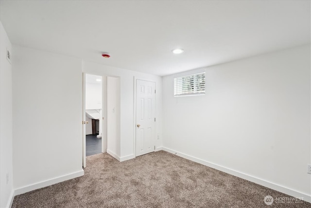 unfurnished bedroom with recessed lighting, carpet, and baseboards