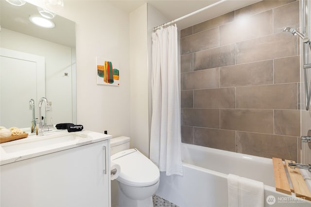 bathroom featuring shower / tub combo with curtain, vanity, and toilet