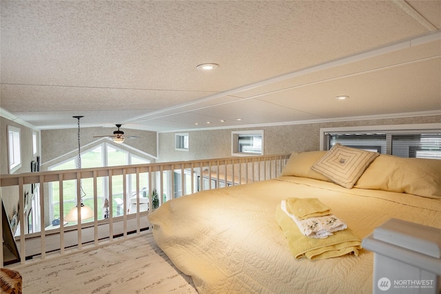 bedroom with vaulted ceiling with beams and crown molding