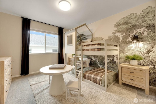 bedroom with carpet flooring and baseboards