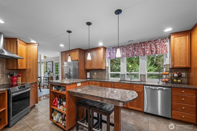 kitchen with appliances with stainless steel finishes, light tile patterned flooring, a sink, and open shelves