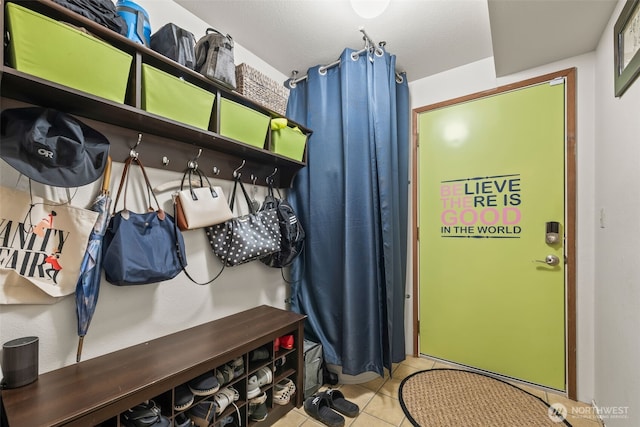 mudroom with tile patterned flooring