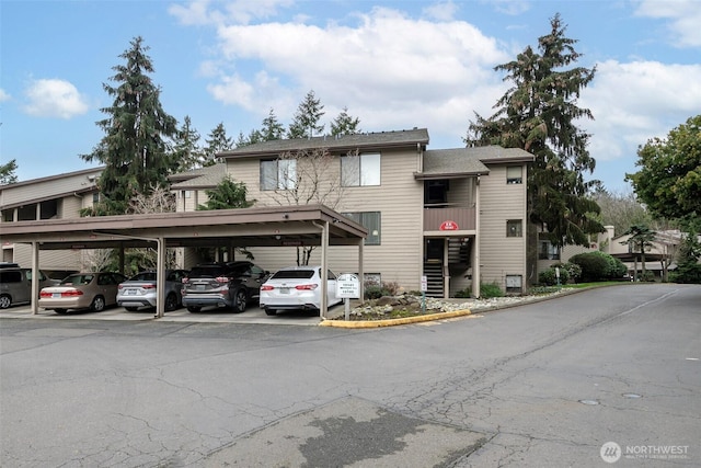 view of property with covered parking