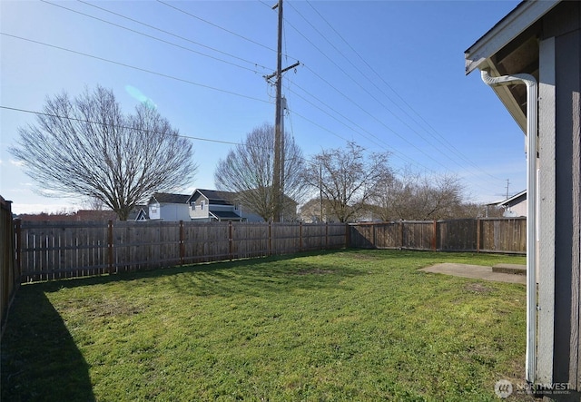 view of yard featuring a fenced backyard