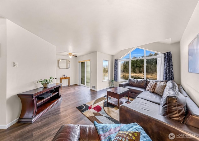 living area with ceiling fan, wood finished floors, visible vents, and baseboards