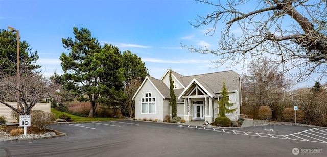 view of front of home featuring uncovered parking