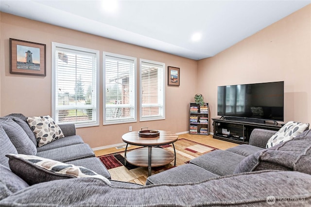 living room featuring baseboards