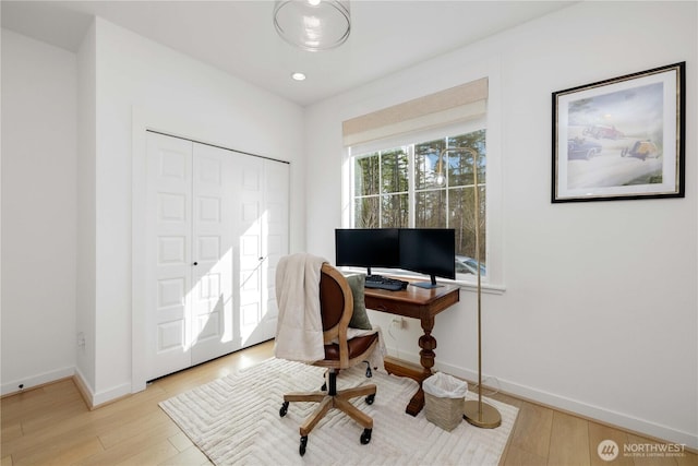 office with light wood-style flooring, baseboards, and recessed lighting