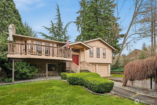 view of front of home with a wooden deck, stairs, a front lawn, a garage, and stone siding