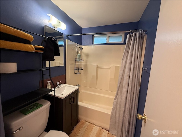 bathroom featuring toilet, shower / bath combo, wood finished floors, and vanity