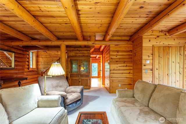 carpeted living area featuring wooden ceiling and beamed ceiling