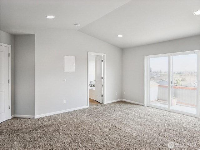 empty room with recessed lighting, baseboards, carpet floors, and lofted ceiling