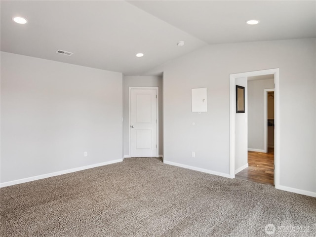 spare room featuring visible vents, recessed lighting, baseboards, and carpet floors