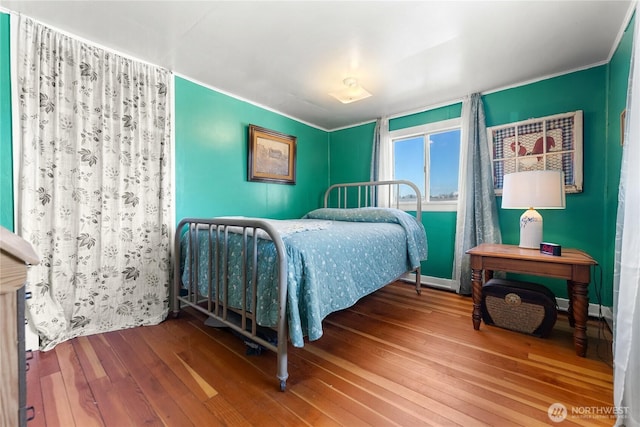 bedroom featuring hardwood / wood-style floors