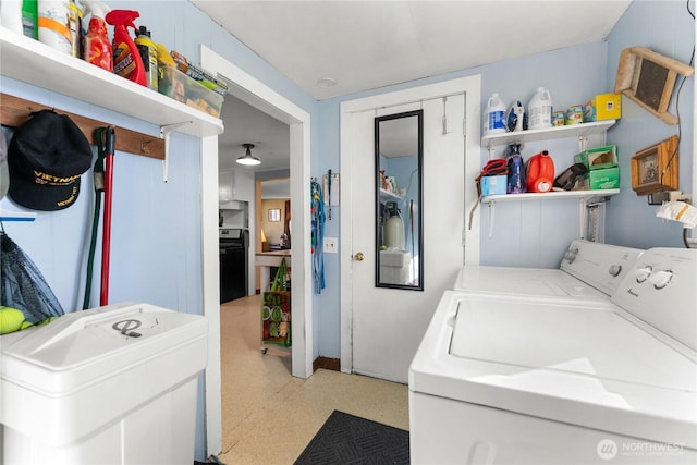 laundry room featuring laundry area and separate washer and dryer