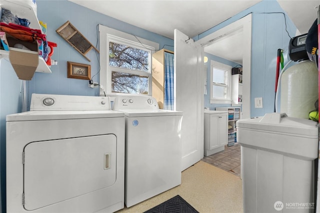 laundry area featuring laundry area, independent washer and dryer, and visible vents