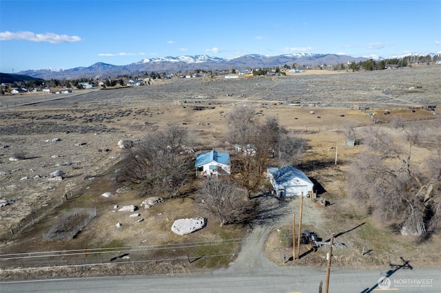 bird's eye view with a mountain view