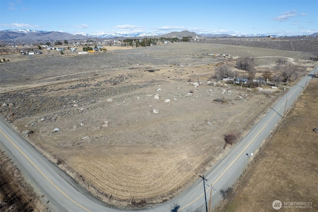 bird's eye view with a mountain view and a rural view