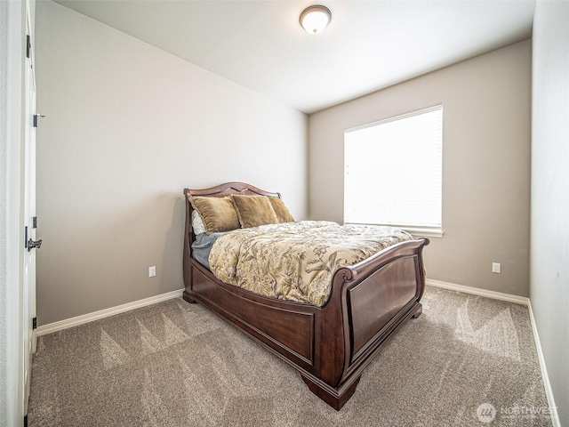 carpeted bedroom with baseboards