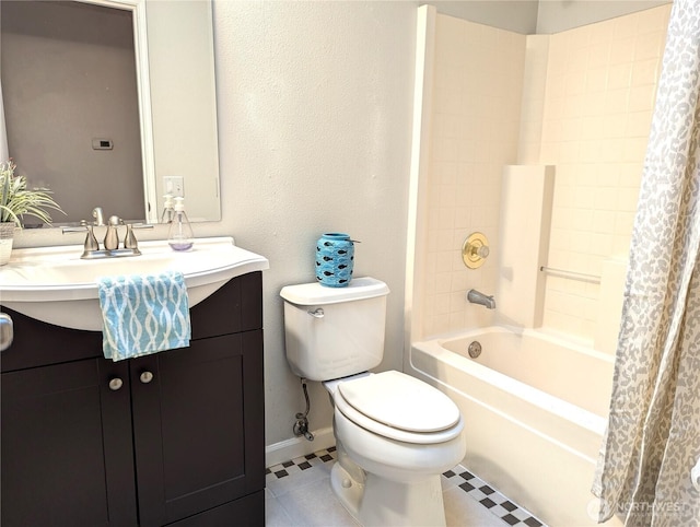 full bath with baseboards, toilet, shower / tub combo with curtain, tile patterned floors, and vanity