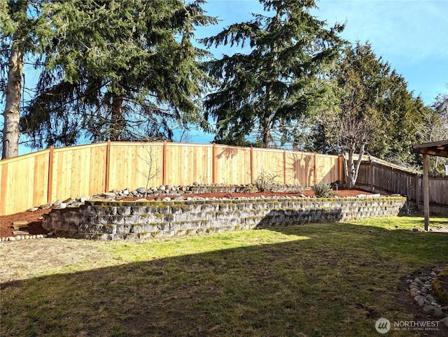 view of yard featuring a fenced backyard