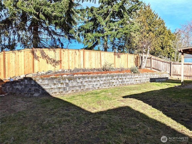 view of yard featuring a fenced backyard