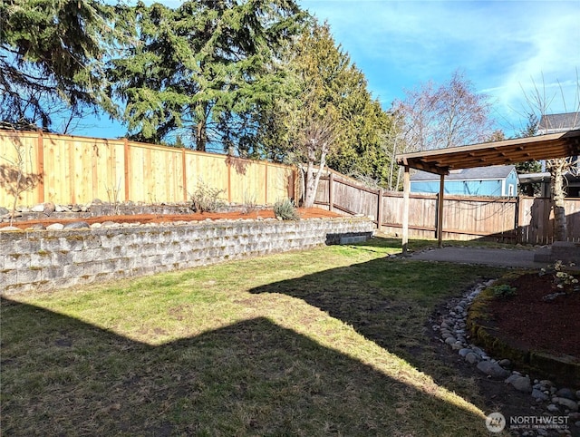 view of yard featuring a fenced backyard