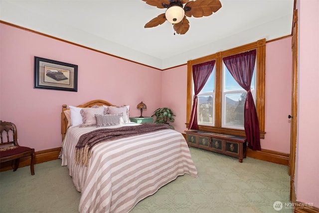 bedroom featuring carpet floors, ceiling fan, and baseboards